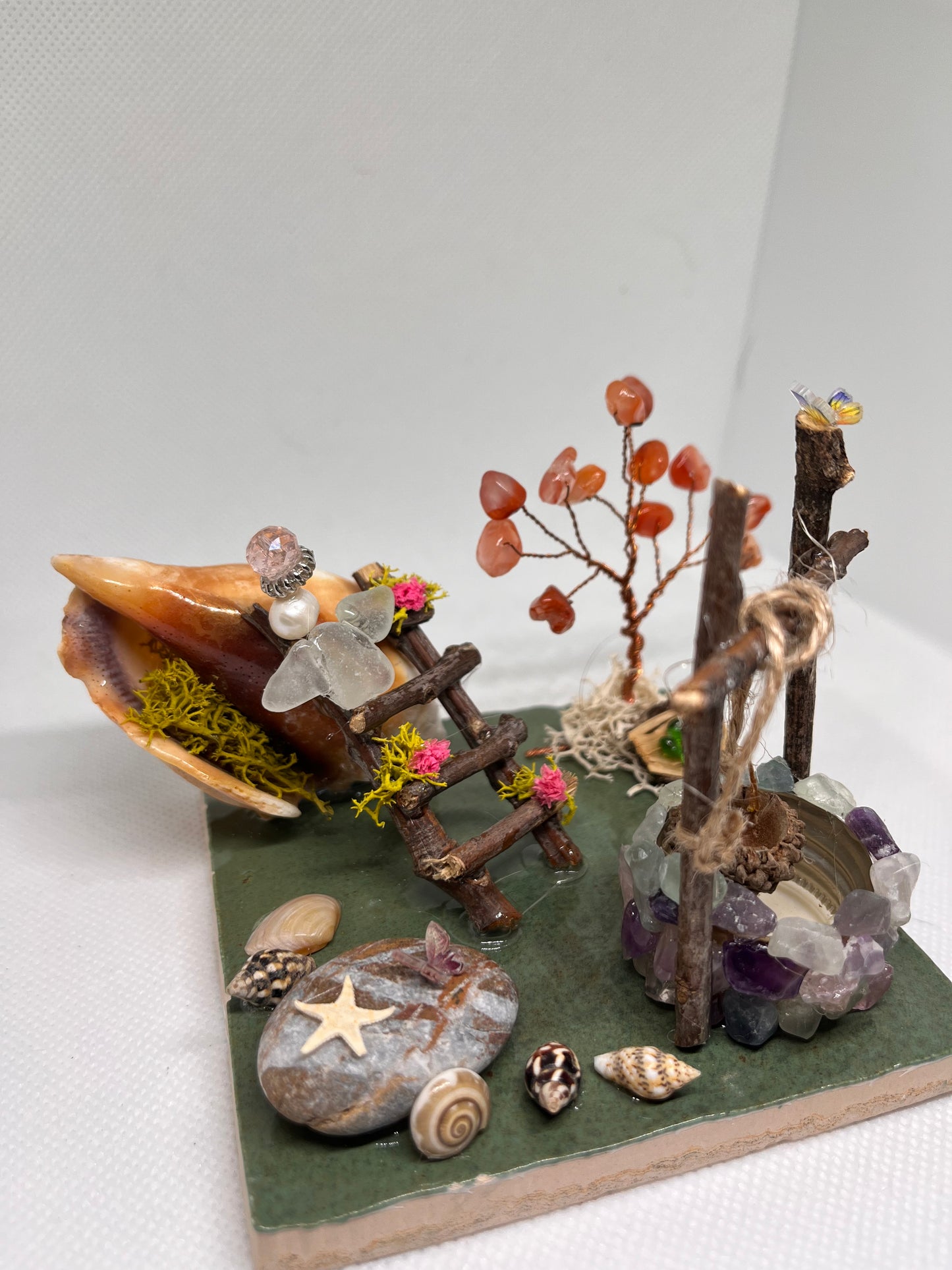 The Wishing Well and Floral Ladder on Tile: White Sea Glass Fairy Cottage Conch Shell w/ Fluorite Wishing Well and Carnelian Tree