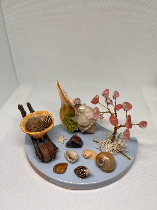 Wheelbarrow on Blue Tile: White Sea Glass Fairy Cottage Conch Shell w/ Watermelon Quartz Tree