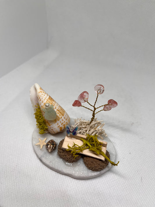 White Sea Glass Fairy Cottage Conch Shell w/ Wood and Acorn Bench and Watermelon Quartz Tree on Round White Tile