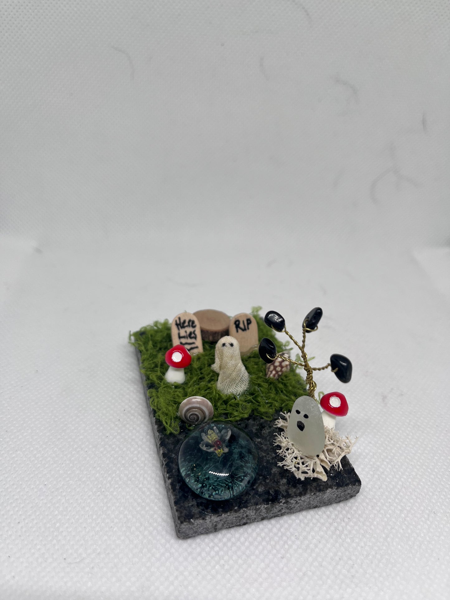 Spooky Elegance: White Sea Glass Ghost Graveyard